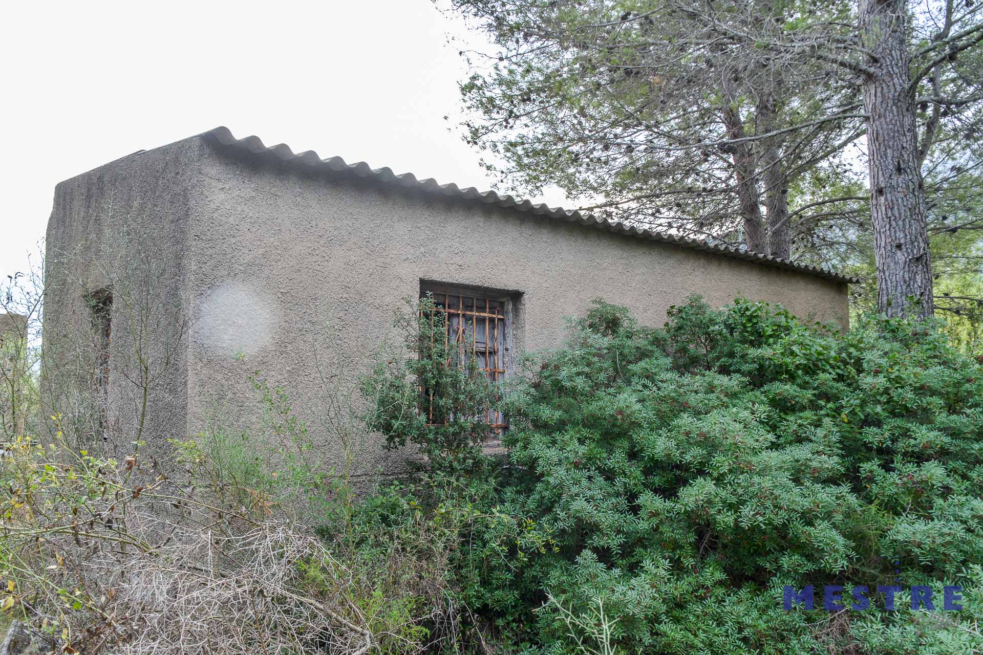 Grond met huisje te koop in Alcalalí
